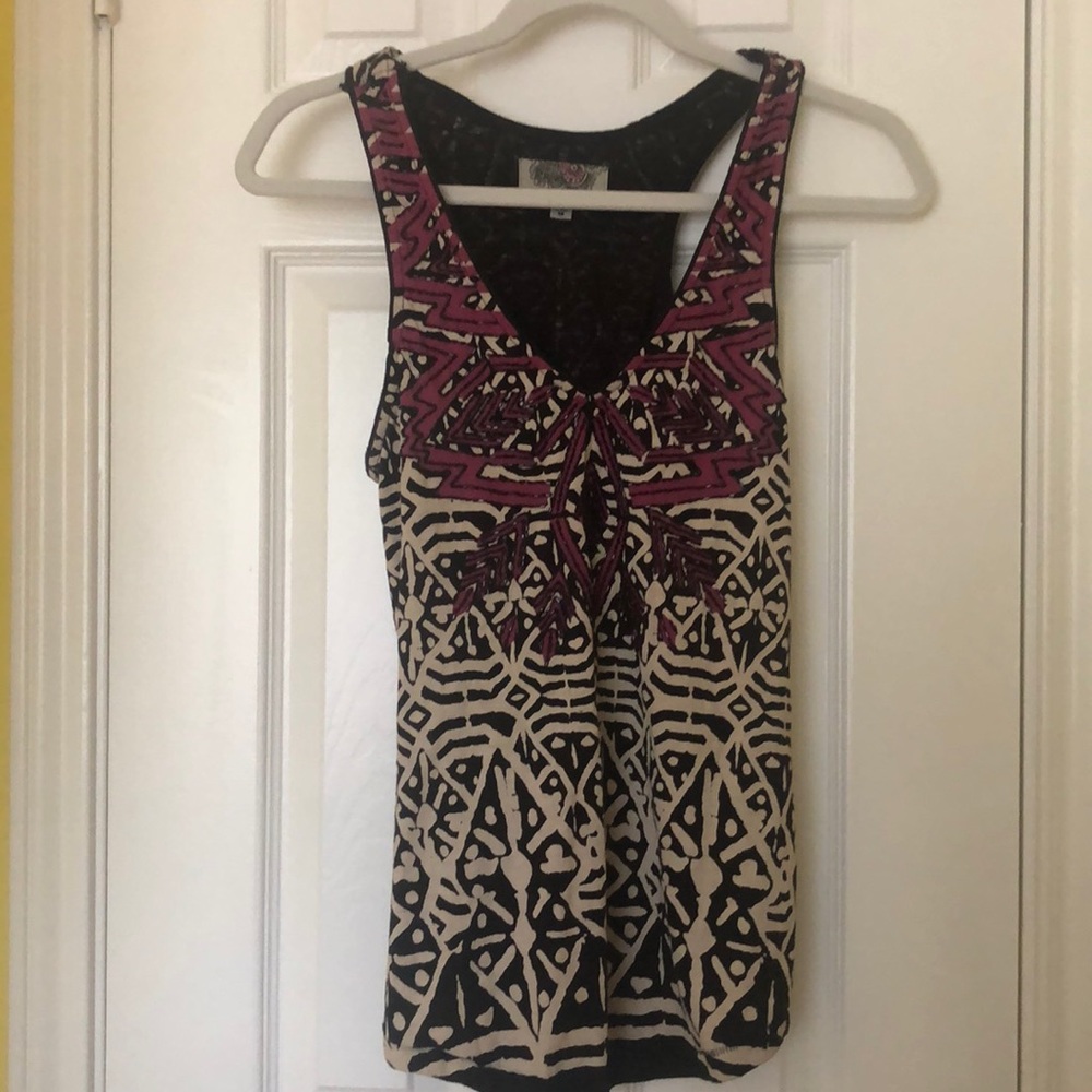 Embellished tank